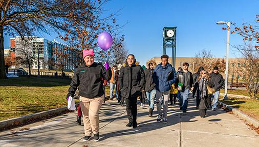 Students leading a campus tour at Open House